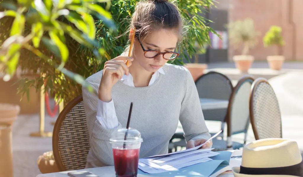 woman reviewing documents