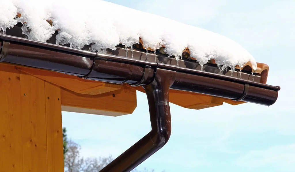 ice on the roof and a nice roof gutter