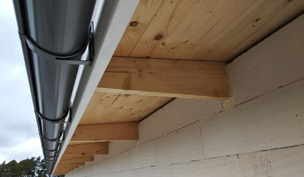 wooden roof boards with plastic gutter
