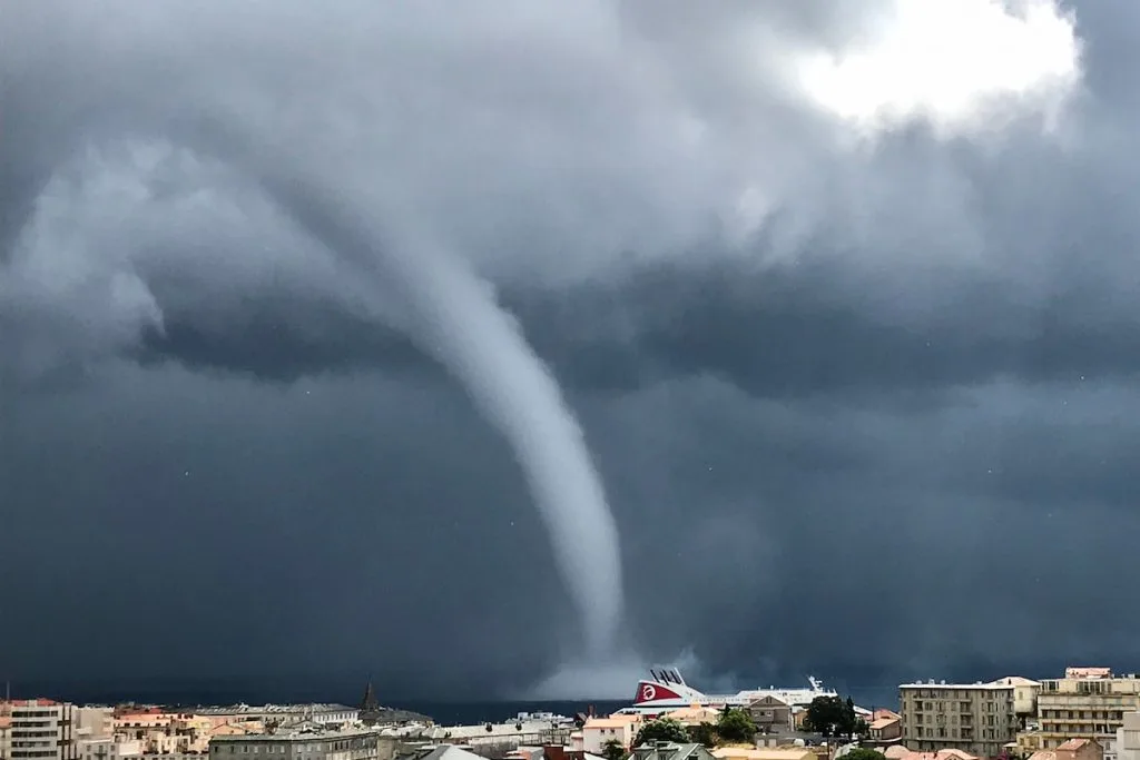 Tornado hits the sea near the city