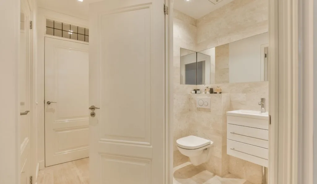 Luxury interior design of a bathroom with marble walls

