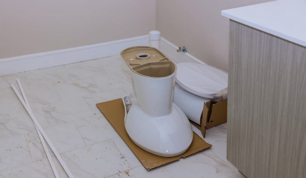 Preparation toilet tank in bathroom plumbing at home