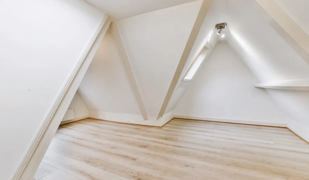 Stylish minimalistic attic room 
