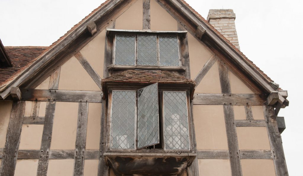 Tudor diamond grid window style of an old house in UK