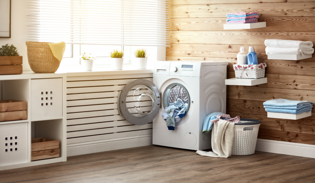 laundry room with wood flooring
