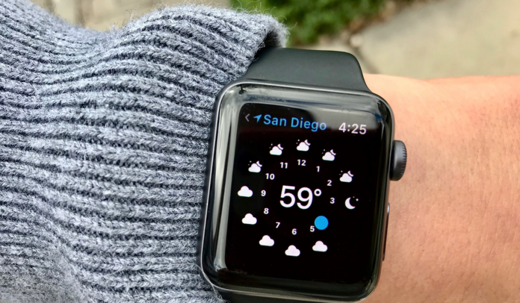 Checking the weather forcast on an Apple Watch.
