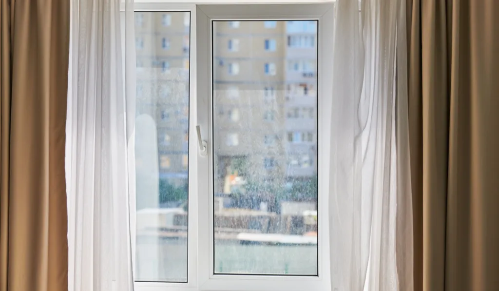 window with open curtains