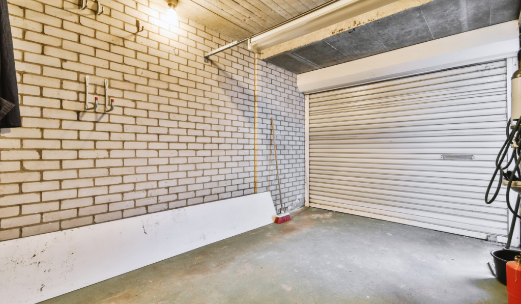 Spacious garage with brick walls
