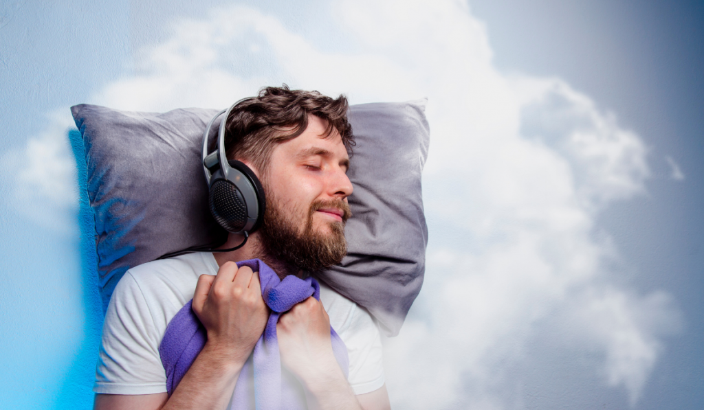 Man with headphones, sound asleep, sleeping in clouds
