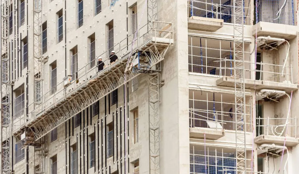 Metal safety scaffolding in a skyscraper under construction.